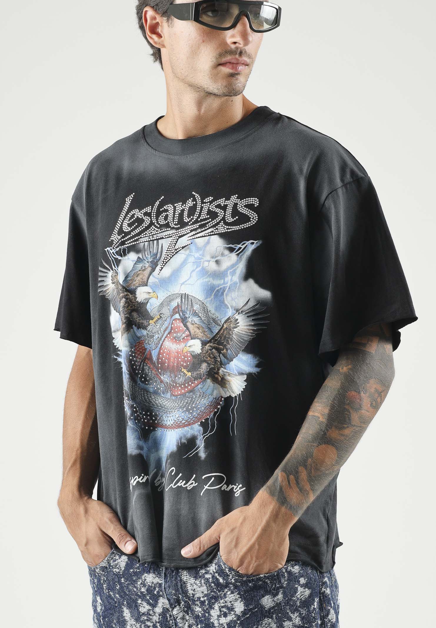 LES ARTISTS T-shirt  EAGLES nera per uomo e donna con maxi stampa grafica frontale multicolore ed effetto vintage. 27SSLATS1134 121 LES ARTISTS 