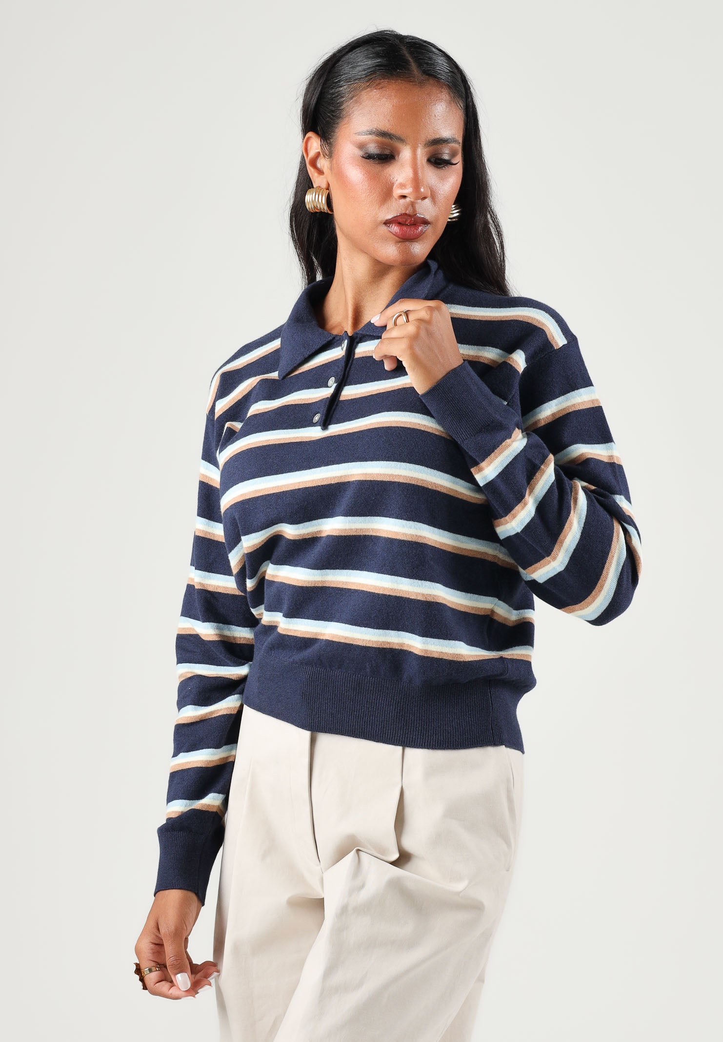 LEVI'S® Polo manica lunga multicolore-nera da donna con abbottonatura corta e motivo a righe orizzontali. 007VY-0003 . LEVI'S® 
