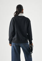 MM6 MAISON MARGIELA Felpa girocollo CREWNECK nera per donna, ragazzi e bambini con logo numerico MM6 stampato sul davanti. M61116MM02X M6900 MAISON MARGIELA 