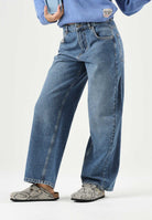 N°21  Jeans BOY'S FLARE blu-denim per donna, ragazzi e bambini con logo label frontale e gamba flare.<BR/> N210FBN0534 0N01 N21 