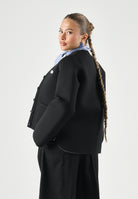 N°21 Cardigan LAYERED black azzurro per donna, ragazzi e bambini con logo patch frontale e fondo effetto sovrapposto a righe.<BR/> N210FGN0516 0N900 N21 