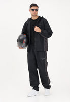 NEW BALANCE Giacca a vento Trackside nera da uomo MJ61A4P8BK . NEW BALANCE 