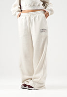 NEW BALANCE Pantaloni TRACKSIDE FLEECE bianco-panna da donna WB62983ALIT . NEW BALANCE 
