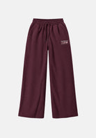 NEW BALANCE Pantaloni TRACKSIDE FLEECE PANT Cherry Leather bordeaux scuro da donna WB62983AYLR . NEW BALANCE 