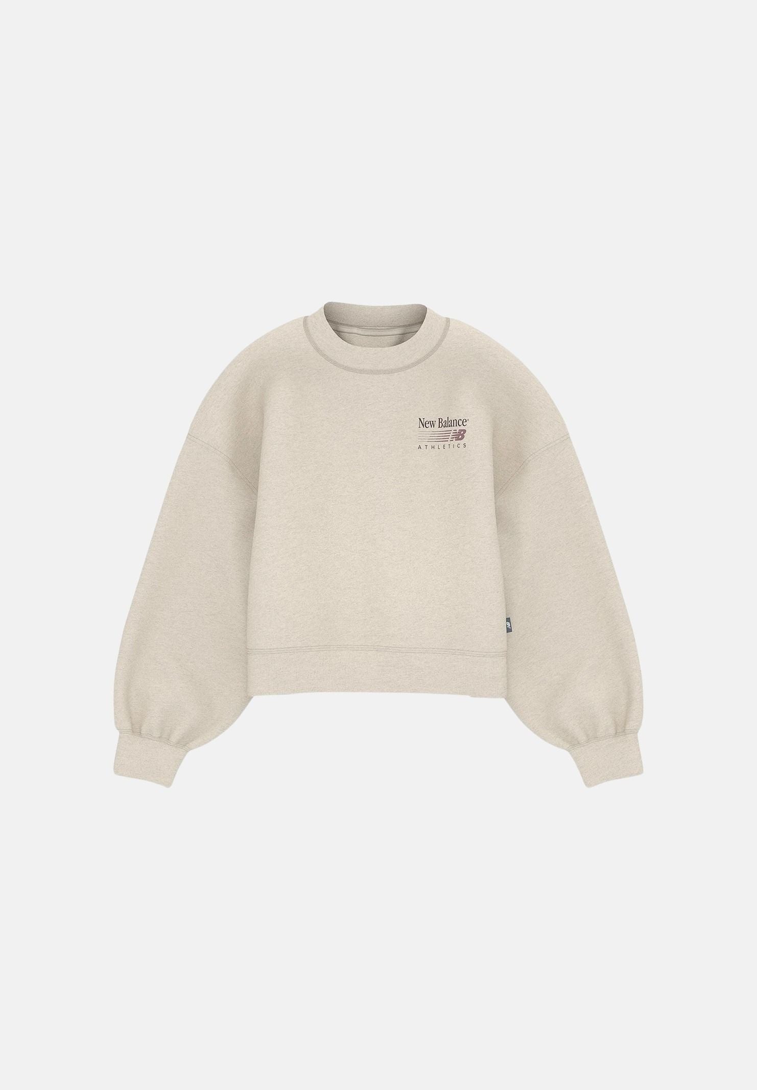 NEW BALANCE Felpa girocollo TRACKSIDE FLEECE CREW beige mélange  da donna con mini logo laterale WT62T7JOLIT . NEW BALANCE 