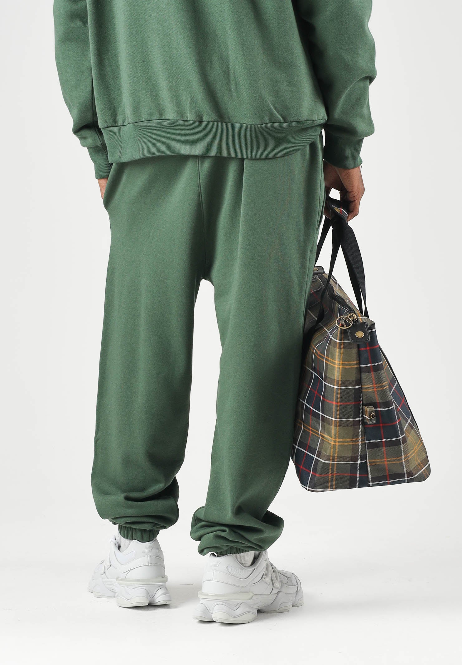 NEW ERA Pantaloni jogger NEW YORK YANKEES CIG verde bosco unisex, con vita elasticizzata, tasche laterali, logo NY ricamato e fondo elasticizzato.<BR/> 60897380 . NEW ERA 