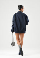 NEW ERA Giacca a vento blu per uomo e donna con ricamo del logo New York Yankees tono su tono sul petto. 60897438 . NEW ERA 