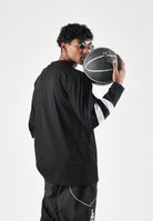 NEW ERA Maglia girocollo nera per uomo e donna con maxi logo frontale 60897486 . NEW ERA 
