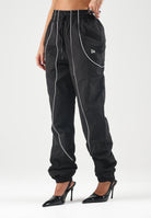 NEW ERA Pantaloni sportivi nero scuro per uomo e donna con mini logo laterale. 60897501 . NEW ERA 