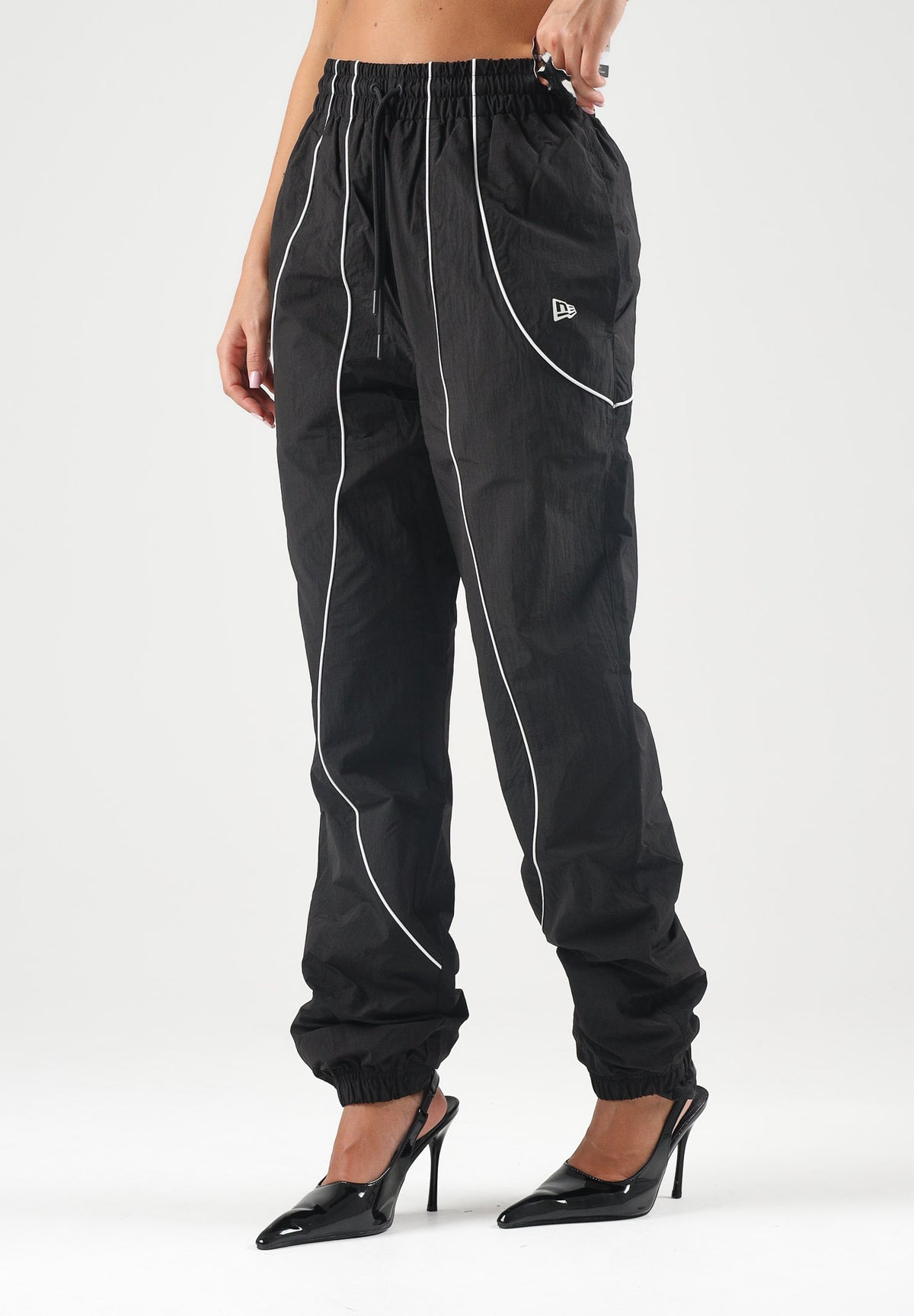 NEW ERA Pantaloni sportivi nero scuro per uomo e donna con mini logo laterale. 60897501 . NEW ERA 
