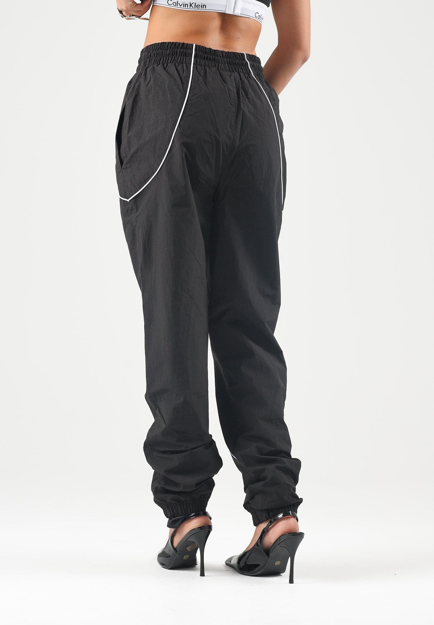 NEW ERA Pantaloni sportivi nero scuro per uomo e donna con mini logo laterale. 60897501 . NEW ERA 