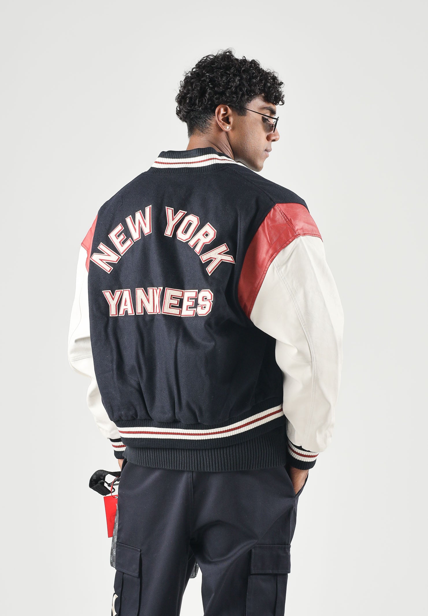 NEW ERA Bomber multicolor blu navy per uomo e donna con logo iconico laterale 60897510 . NEW ERA 
