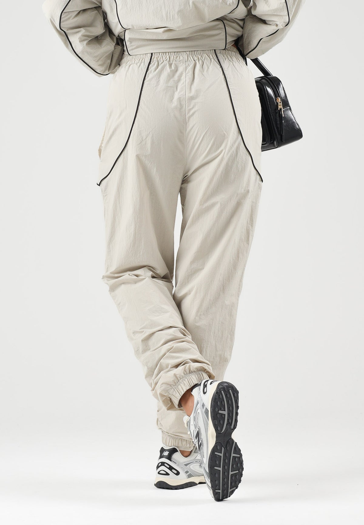 NEW ERA Pantaloni sportivi sabbia/ beige chiaro per uomo e donna 60897518 . NEW ERA 