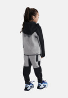 NIKE Tuta Tech Fleece nera e grigia per bambino e bambina con logo 86M880 K90 NIKE 