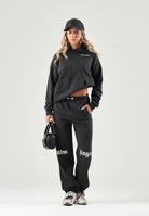 PALM ANGELS Felpa BEAR HOODIE nera per donna, ragazza e bambina con cappuccio fisso, tasca a marsupio e logo stampato a contrasto F6PAJBHS011 110 PALM ANGELS 