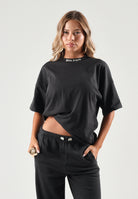 PALM ANGELS T-shirt a manica corta nera per donna, ragazza e bambina con logo sul colletto e maxi stampa posteriore. F6PAJBTH012 110 PALM ANGELS 