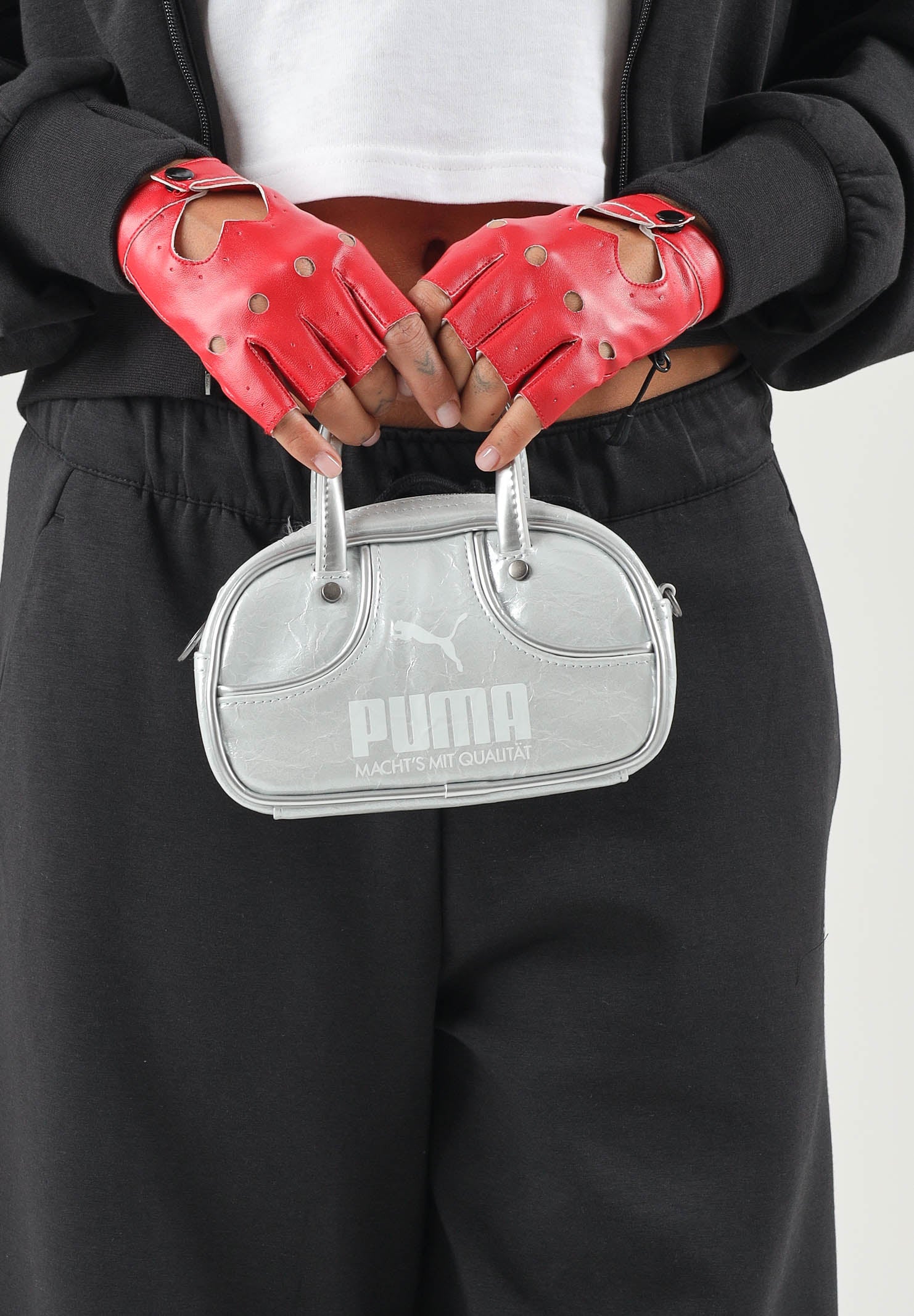 PUMA Borsa mini a mano grigio da donna con finitura metallizzata, doppi manici e tracolla removibile. 092862 01 PUMA 
