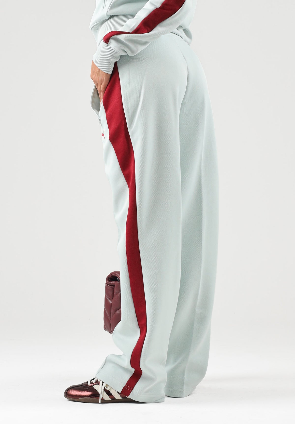PUMA Pantaloni sportivi T7 Always verde acqua da donna con bande laterali rosse 629797 29 PUMA 