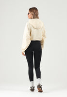 PUMA Giacca a vento PUMATECH  giallo burro da donna con cappuccio fisso e fondo regolabile. 636654 88 PUMA 