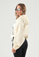 PUMA Giacca a vento PUMATECH  giallo burro da donna con cappuccio fisso e fondo regolabile. 636654 88 PUMA 