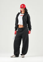 PUMA Pantalone PUMATECH nero da donna con linea balloon, vita elasticizzata e coulisse 636659 01 PUMA 