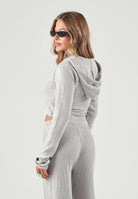 PUMA Felpa con zip ESSENTIALS beige per donna con trama a coste,  chiusura a cerniera. 636669 81 PUMA 