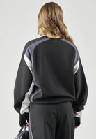 PUMA Felpa girocollo MOTO CREWNECK nera per uomo e donna con dettagli color block, logo frontale 636723 01 PUMA 