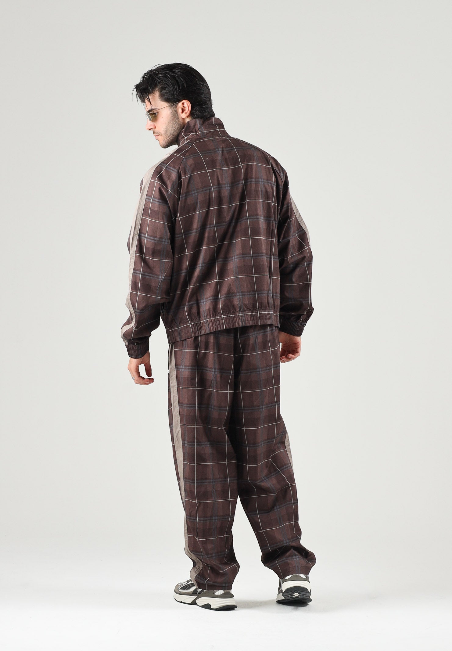 PUMA Felpa con zip PLAID TRACK JACKET marrone per uomo con motivo a quadri tartan, bande laterali a contrasto 636731 33 PUMA 