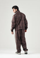 PUMA Felpa con zip PLAID TRACK JACKET marrone per uomo con motivo a quadri tartan, bande laterali a contrasto 636731 33 PUMA 