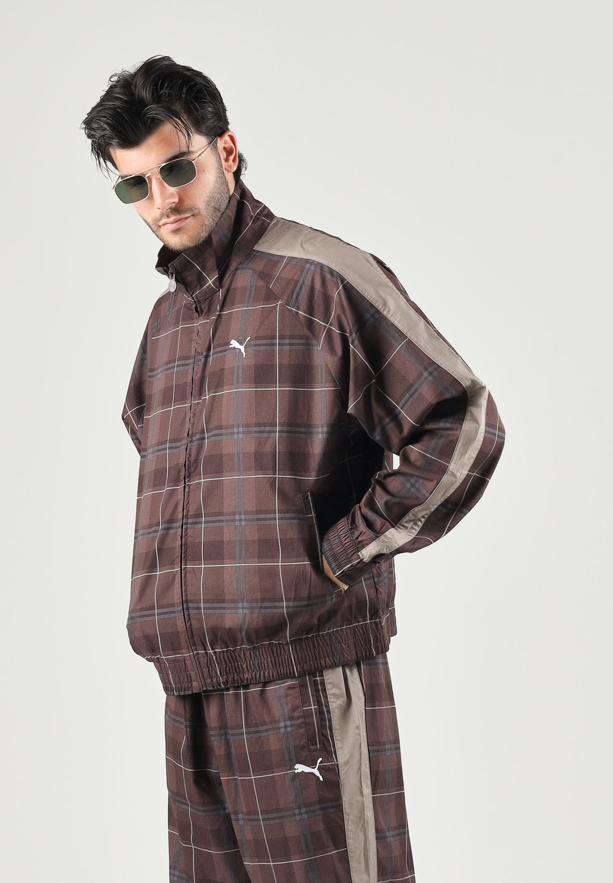 PUMA Felpa con zip PLAID TRACK JACKET marrone per uomo con motivo a quadri tartan, bande laterali a contrasto 636731 33 PUMA 