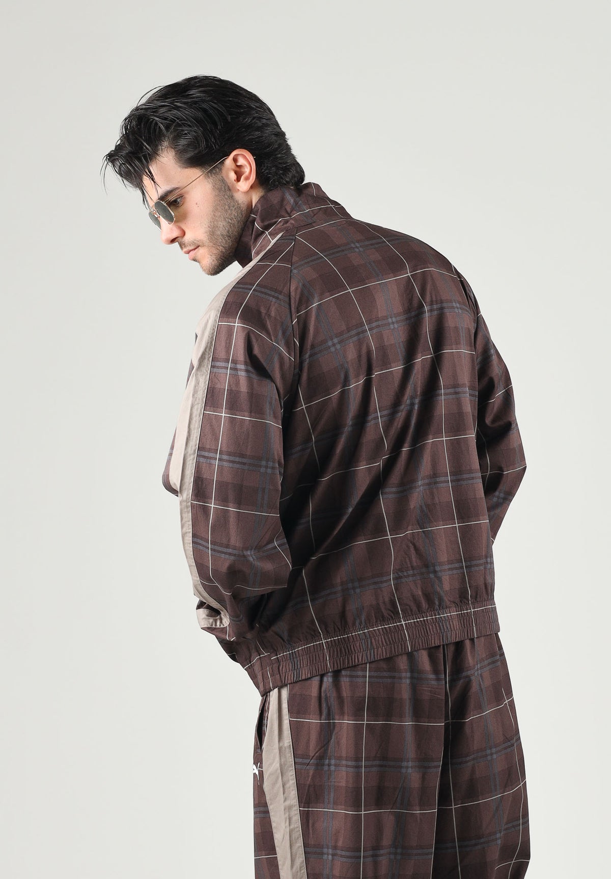 PUMA Felpa con zip PLAID TRACK JACKET marrone per uomo con motivo a quadri tartan, bande laterali a contrasto 636731 33 PUMA 