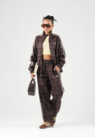 PUMA Giacca a vento PLAID TRACK JACKET marrone per uomo con motivo a quadri tartan, bande laterali a contrasto 636731 33 PUMA 