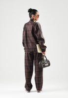 PUMA Giacca a vento PLAID TRACK JACKET marrone per uomo con motivo a quadri tartan, bande laterali a contrasto 636731 33 PUMA 
