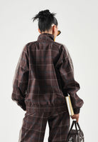 PUMA Giacca a vento PLAID TRACK JACKET marrone per uomo con motivo a quadri tartan, bande laterali a contrasto 636731 33 PUMA 
