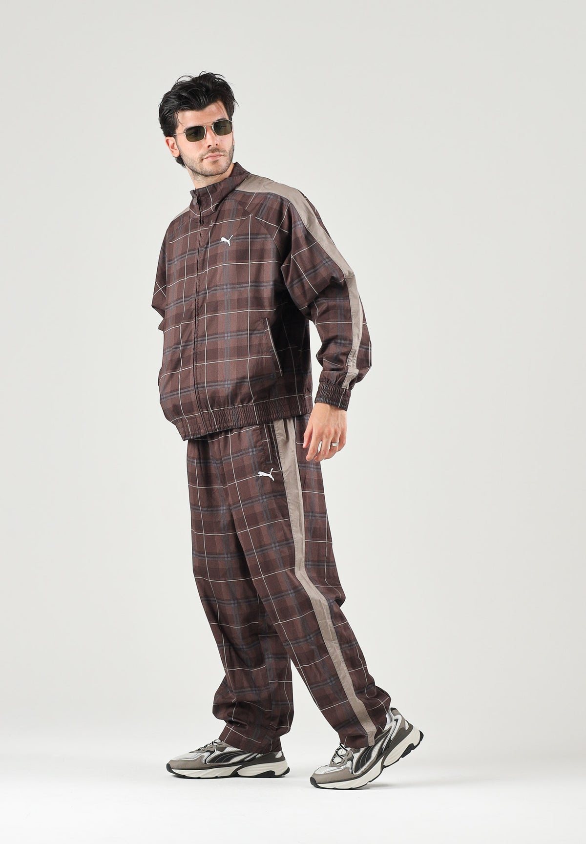 PUMA Pantalone PLAID TRACK PANTS marrone per uomo con fantasia tartan, bande laterali tono su tono 636732 33 PUMA 