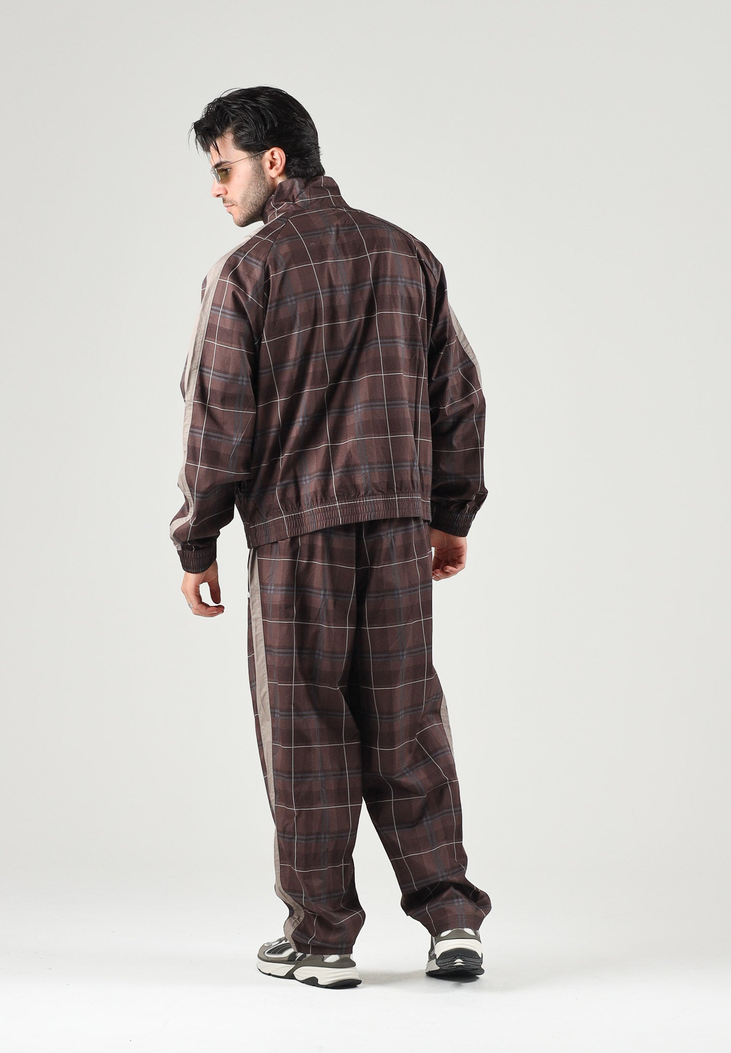 PUMA Pantalone PLAID TRACK PANTS marrone per uomo con fantasia tartan, bande laterali tono su tono 636732 33 PUMA 
