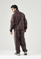 PUMA Pantalone PLAID TRACK PANTS marrone per uomo con fantasia tartan, bande laterali tono su tono 636732 33 PUMA 