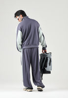 PUMA Felpa con zip OVERSIZED TRACK JACKET grigia per uomo bicolore con inserti a contrasto 636735 35 PUMA 