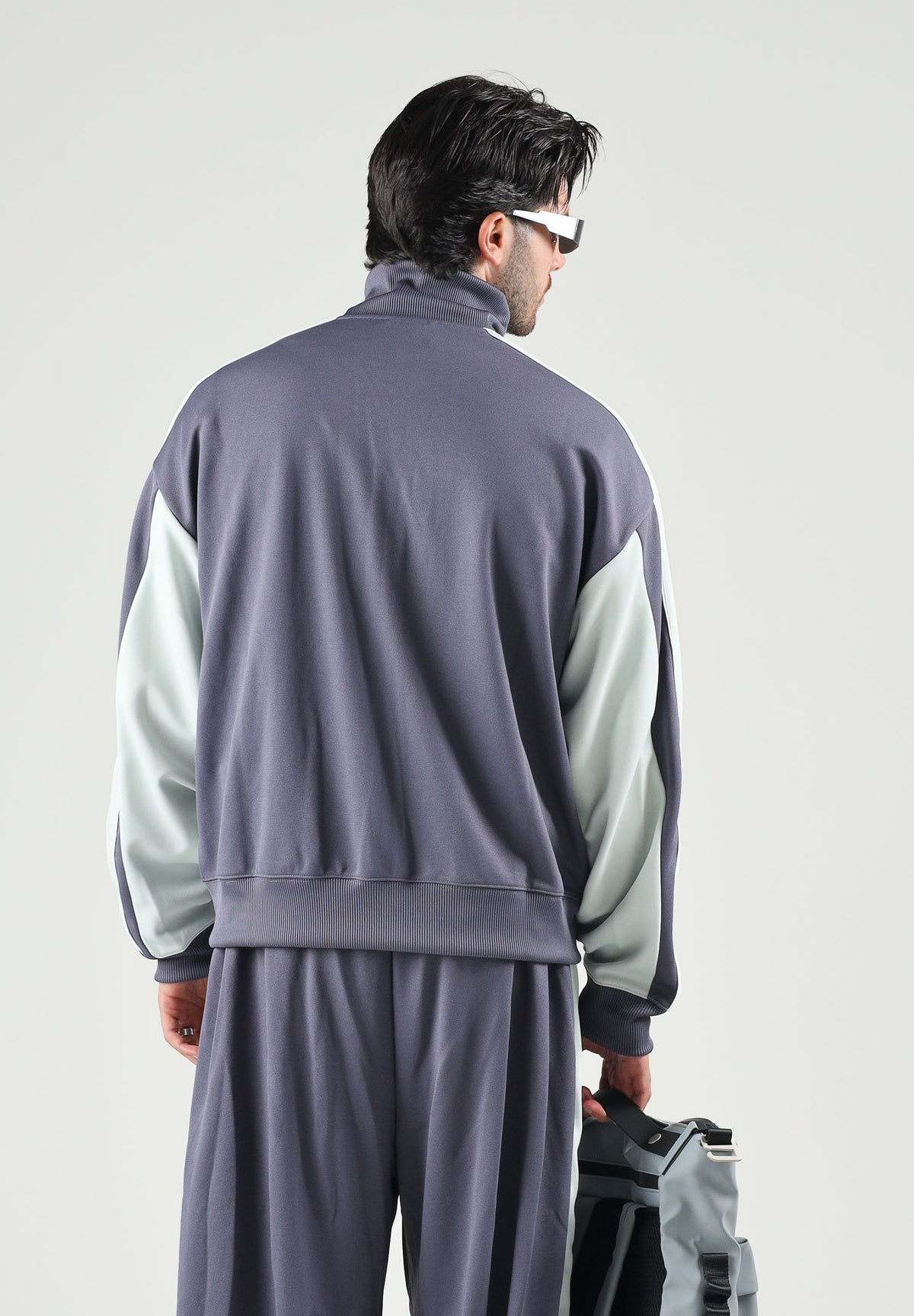 PUMA Felpa con zip OVERSIZED TRACK JACKET viola per uomo bicolore con inserti a contrasto 636735 35 PUMA 