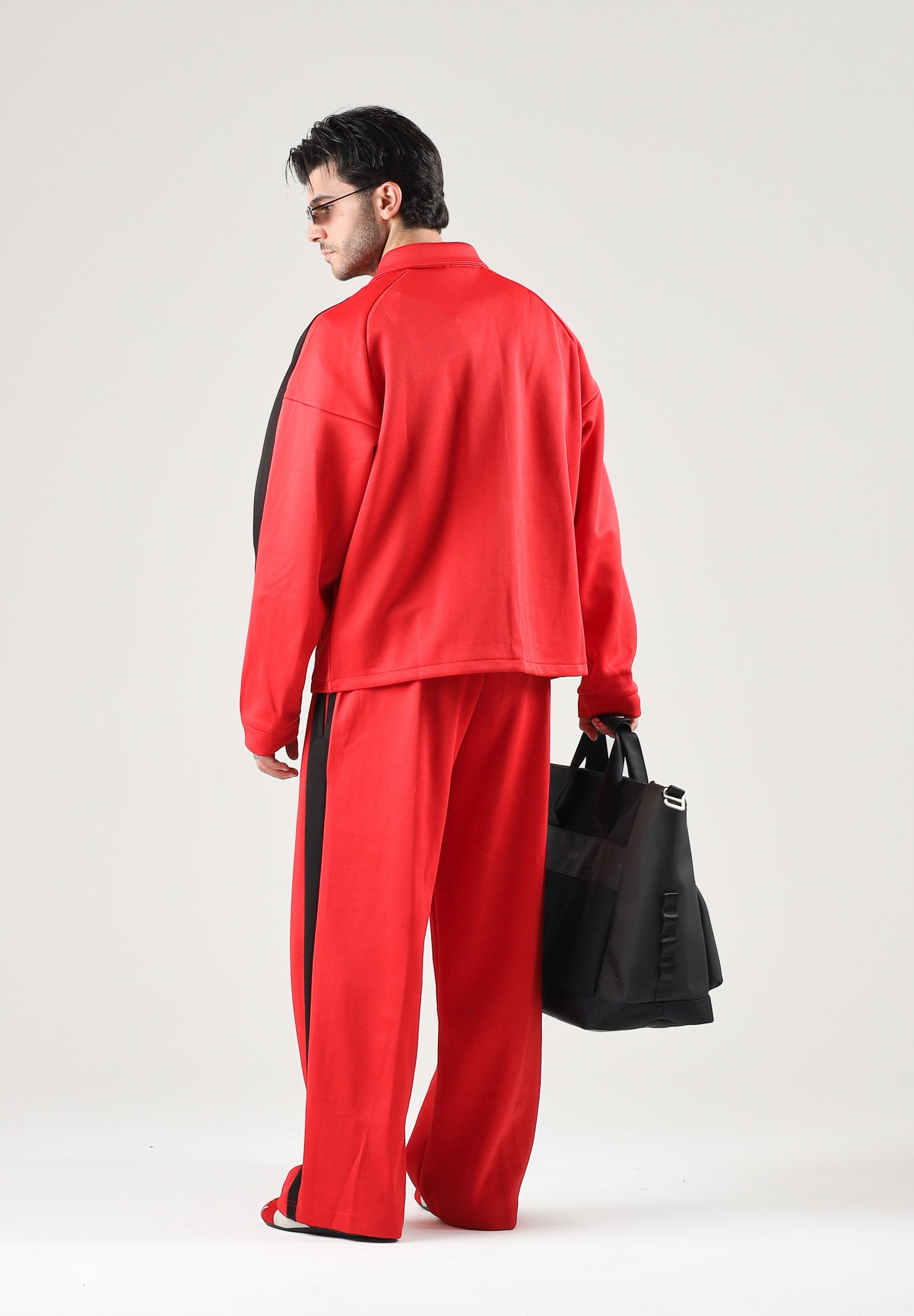 PUMA Giacca FERRARI TRACK rossa da uomo con bottoni a pressione, colletto a camicia e stemma Ferrari 637055 02 PUMA 
