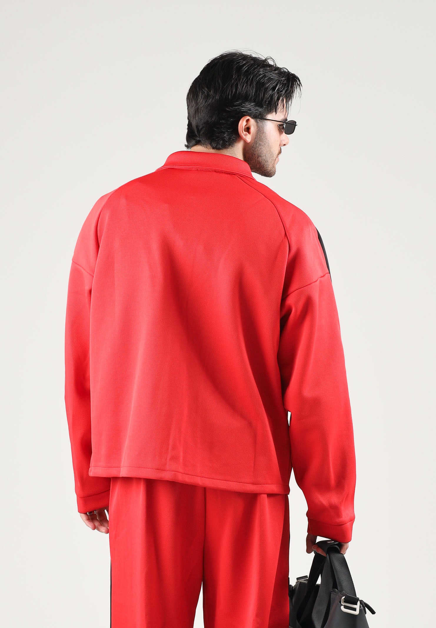 PUMA Giacca FERRARI TRACK rossa da uomo con bottoni a pressione, colletto a camicia e stemma Ferrari 637055 02 PUMA 