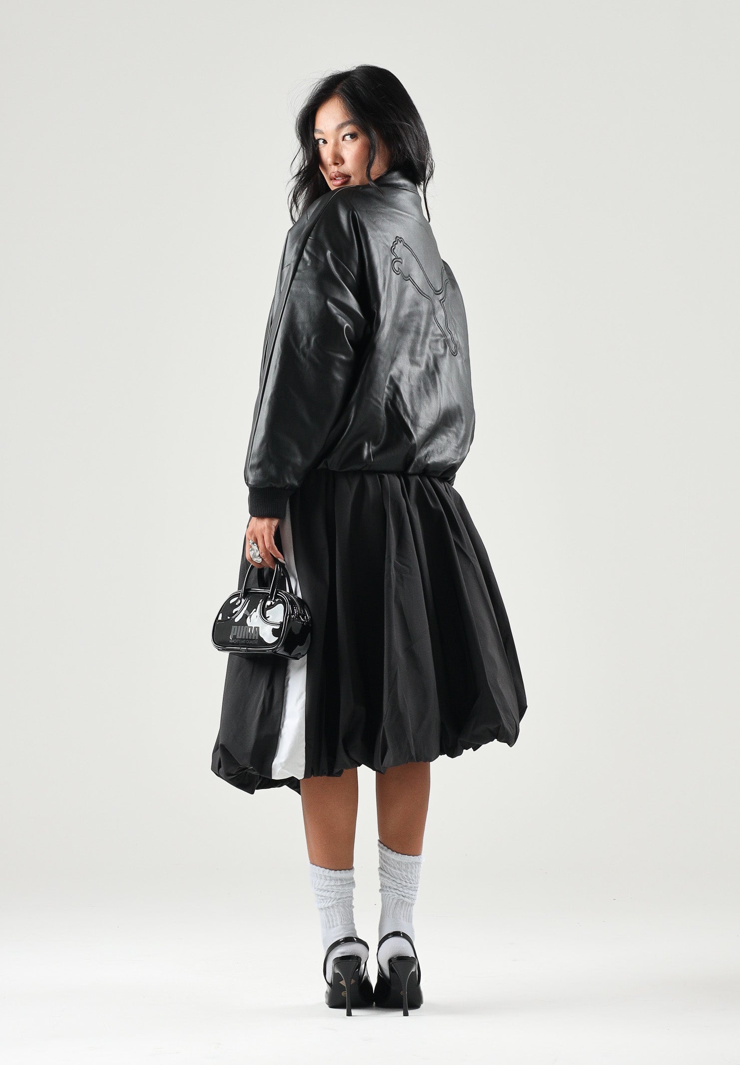PUMA Giubbotto in pelle  FAUX LEATHER  nero da donna con colletto a camicia e zip frontale. 637143 01 PUMA 