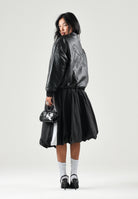 PUMA Giubbotto in pelle  FAUX LEATHER  nero da donna con colletto a camicia e zip frontale. 637143 01 PUMA 