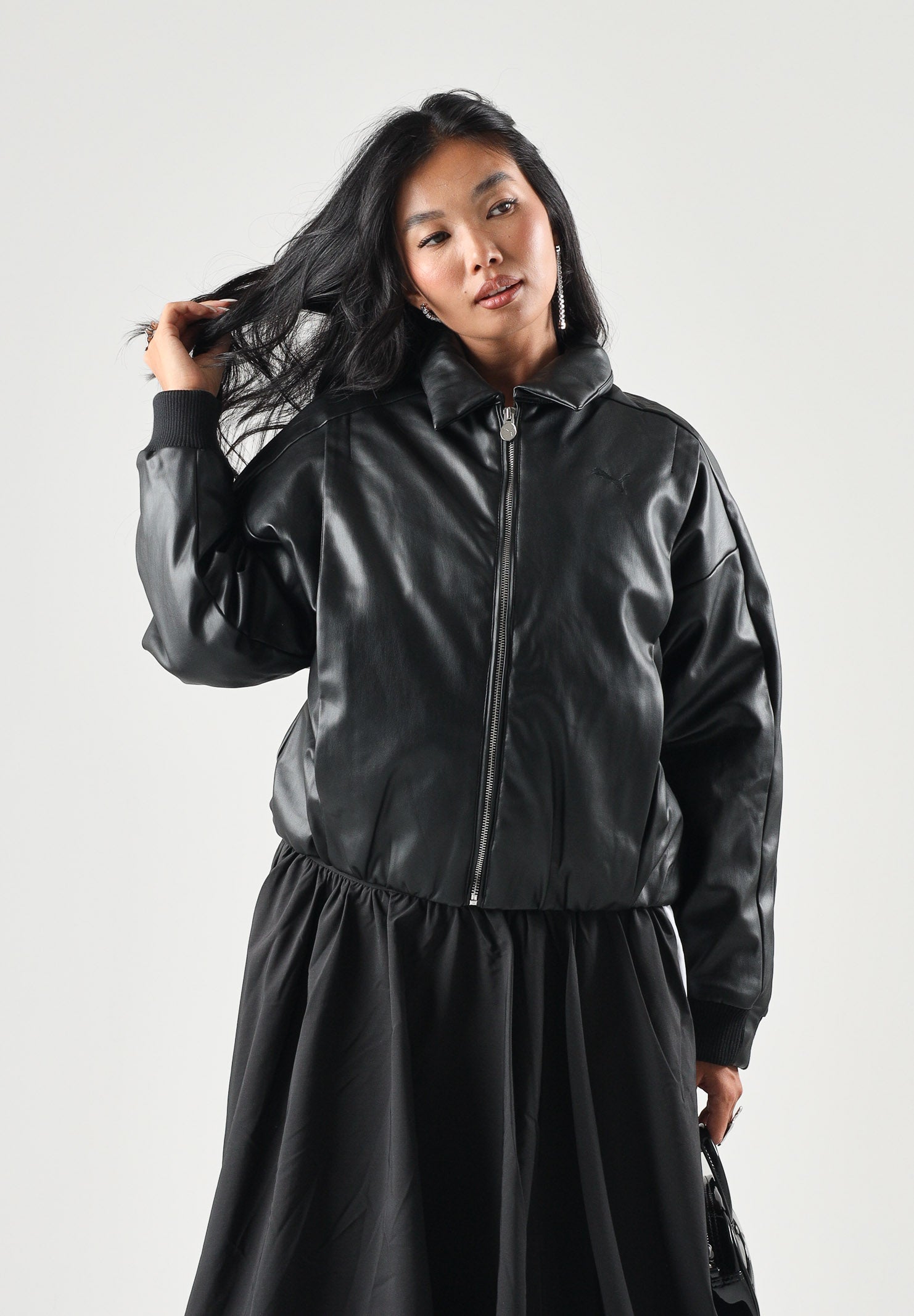 PUMA Giubbotto in pelle  FAUX LEATHER  nero da donna con colletto a camicia e zip frontale. 637143 01 PUMA 