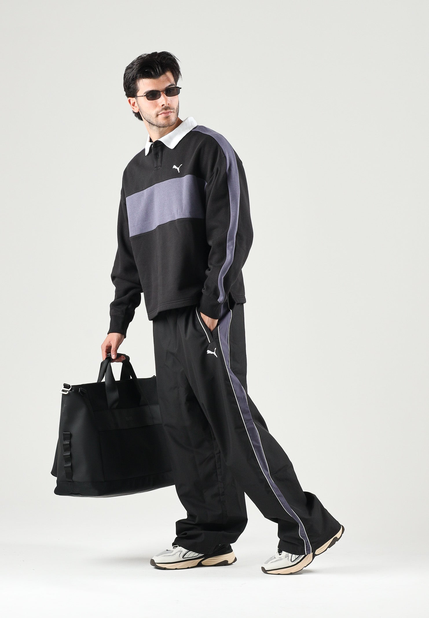 PUMA Pantalone nero da uomo con bande laterali e logo iconico 637378 01 PUMA 
