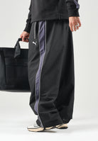 PUMA Pantalone nero da uomo con bande laterali e logo iconico 637378 01 PUMA 
