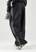 PUMA Pantaloni STRAIGHT neri da uomo con bande laterali e logo iconico 637378 01 PUMA 