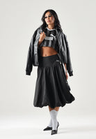 PUMA Gonna DARE TO BALLOON nera da donna con taglio a palloncino e logo PUMA Cat applicato. 637577 01 PUMA 