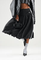PUMA Gonna DARE TO BALLOON nera da donna con taglio a palloncino e logo PUMA Cat applicato. 637577 01 PUMA 