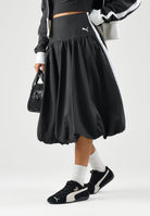 PUMA Gonna DARE TO BALLOON nera da donna con taglio a palloncino e logo PUMA Cat applicato. 637577 01 PUMA 